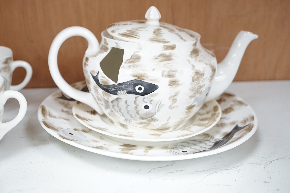 A Foley ‘fish’ part teaset by John Armstrong together with eleven plates designed for Clarice Cliff. Condition - varies